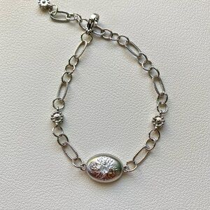 Elegant Silver Bracelet with Floral Design